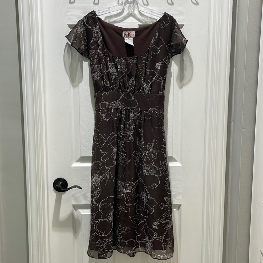 Brown/cream flower design size 14.  Side zip and tie back.